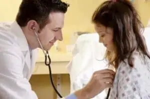 Doctor Checking Chest
